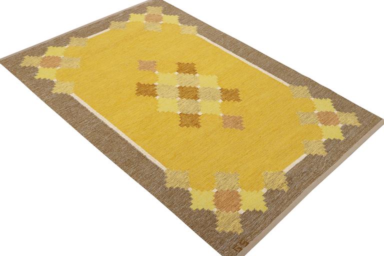 A flat weave carpet, signed GS, c. 205 x 139 cm.