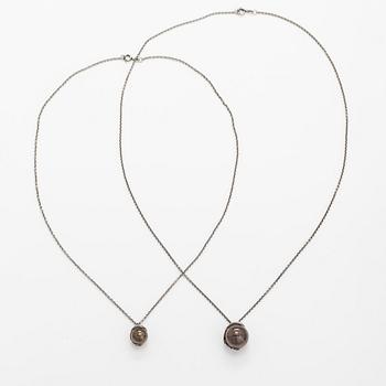 Kai Lindström, Two sterling silver neckalces with ceramic balls "Tintti". Kalevala Koru, Helsinki.