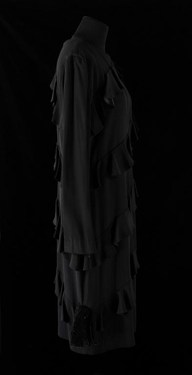 A black evening dress by Balenciaga.