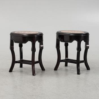 A pair of black-lacquered stools, Japan, around 1900.