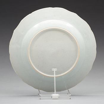 A set of 12 famille rose dinner plates, Qing dynasty, Qianlong (1736-95).