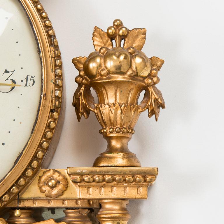 A late gustavian wall clock by Jacob Kock (clockmaker in Stockholm 1762-1803).