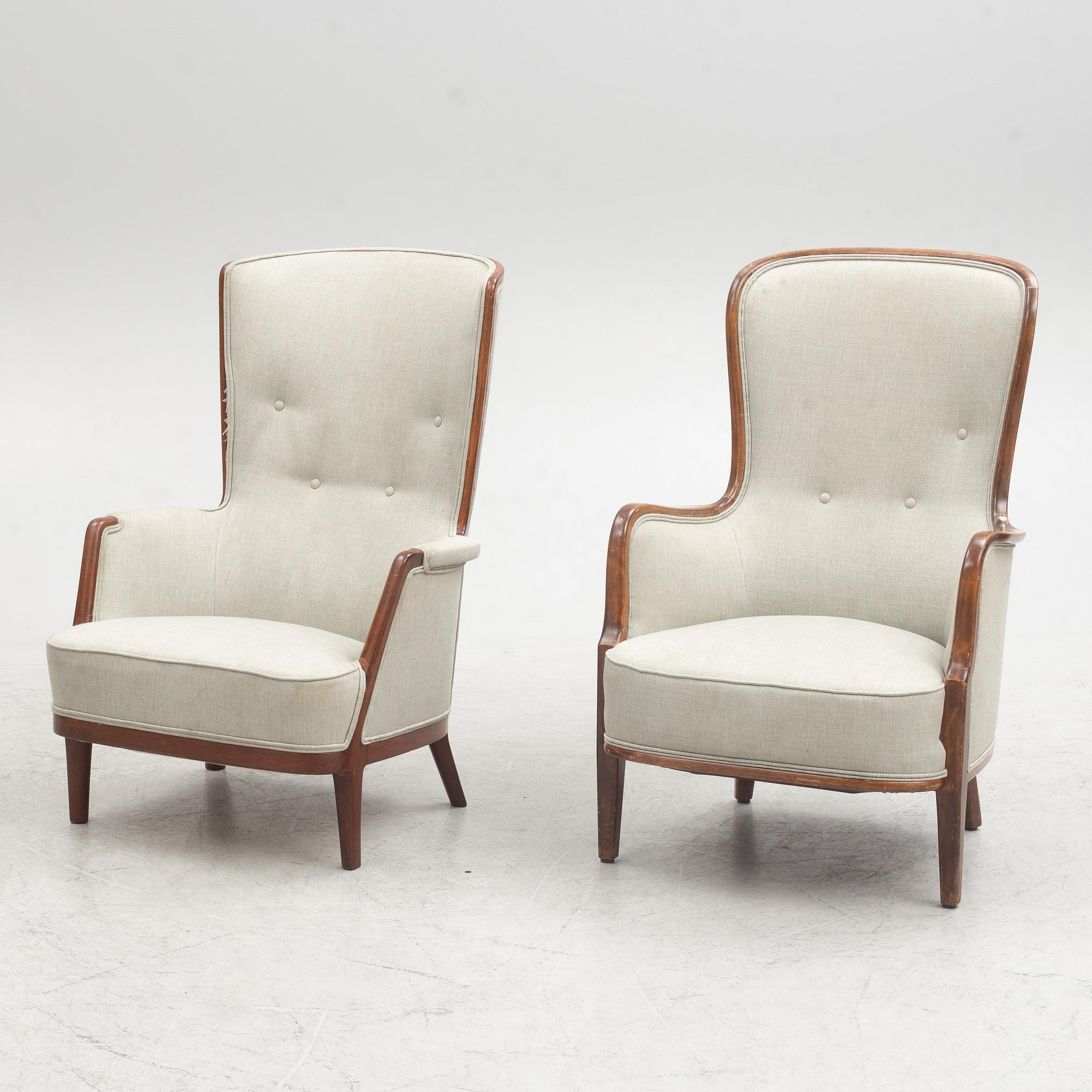 A pair of similar Swedish Modern armchairs, mid 20th century.