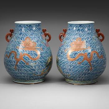 295. A pair of large enamelled vases with five clawed dragons, presumably late Qing dyasty with Yongzheng mark.