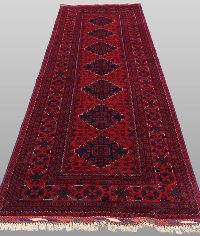 A Afghan runner carpet, 280 x 92 cm.