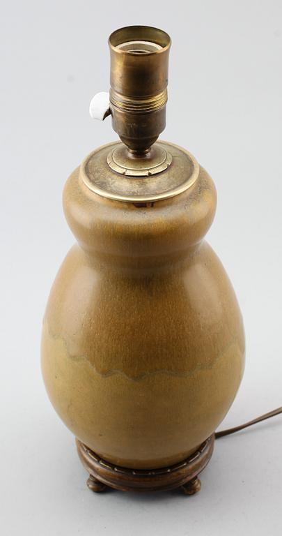 A Patrick Nordström stoneware table lamp, Isle, Royal Copenhagen, 1918.