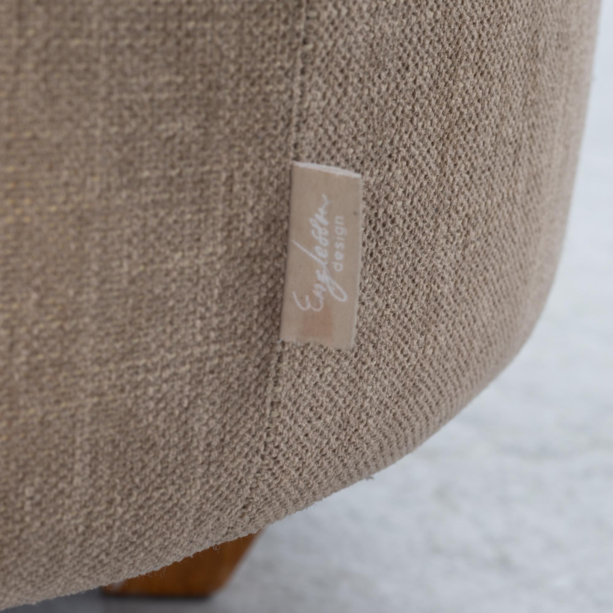 An armchair with footstool, Howard model, Englessons, 21st century.