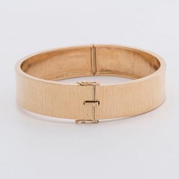 An 18K gold bracelet, 1980, 64g.
