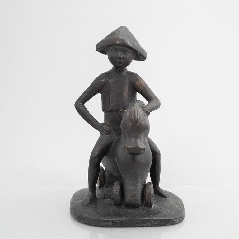 Solvig Pripp, Boy on toy horse.