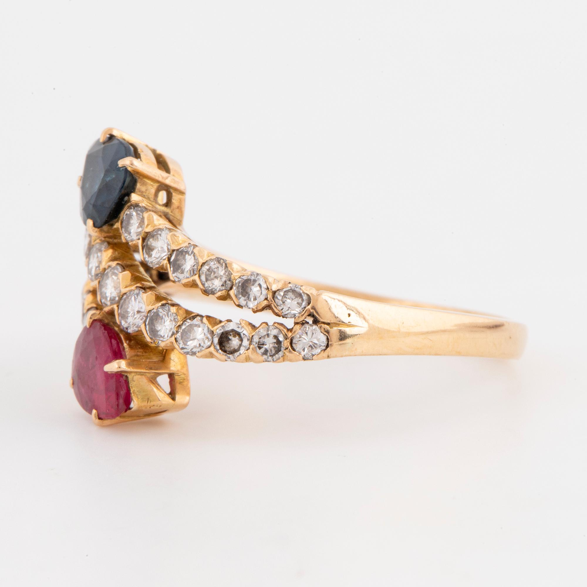 Ruby, sapphire and brilliant-cut diamond ring.