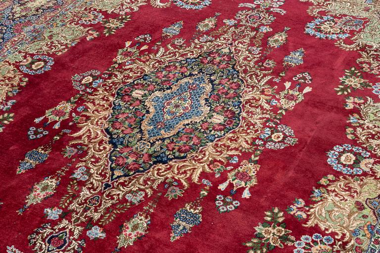 A carpet, Kerman, c. 370 x 275 cm.