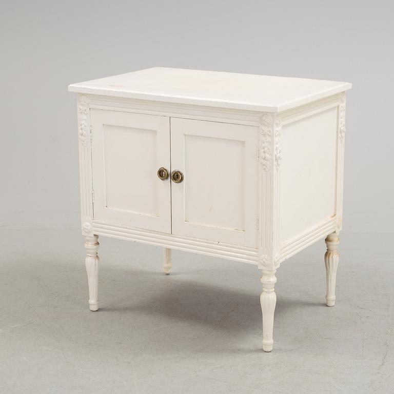 An early 20th century Gustavian style cupboard.