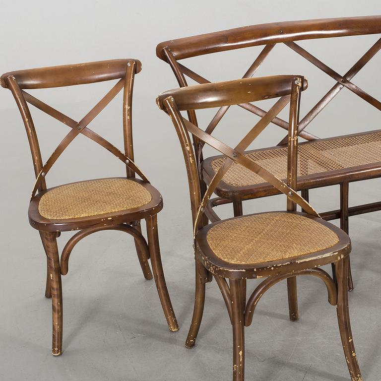 A wooden sofa, a table and four chairs, later part of the 20th century.