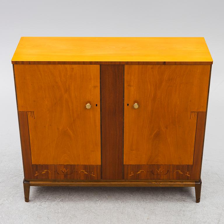 A Swedish Modern cabinet, mid20th century.