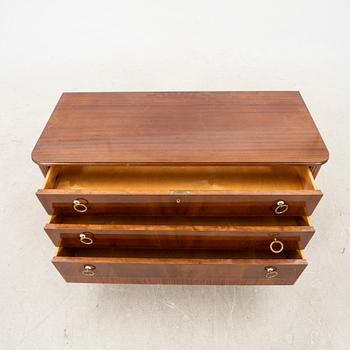 A 1940s mahogany dresser.