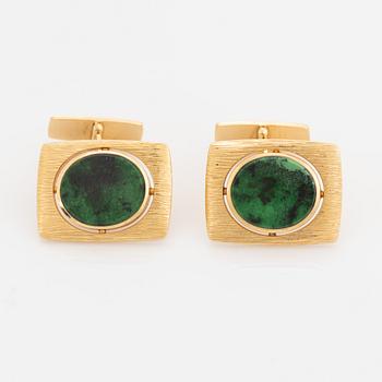 A pair of WA Bolin cufflinks in 18K gold set with most likely grossular garnet.