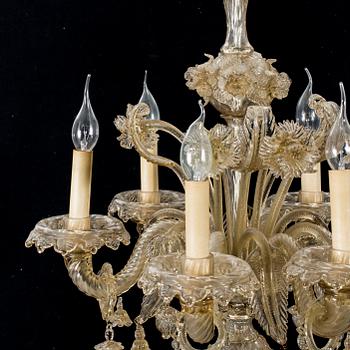 A 20th century six light Venetian style glass chandeliere.