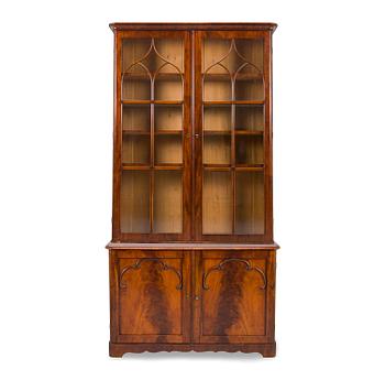 A 1830s/40s mahogany book case cabinet.