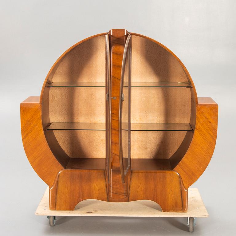 An English 1940s Art Deco walnut display cabinet.