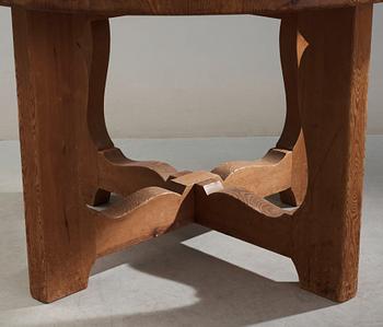 A stained pine dining table, attributed to Axel Einar Hjorth, Nordiska Kompaniet, 1930's.