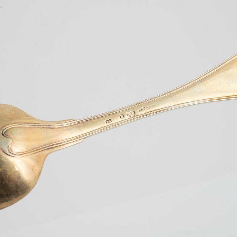 Two silver serving spoons, including Johan Petter Grönwall, Stockholm, 1827, and unidentified master, Stockholm, 1821.