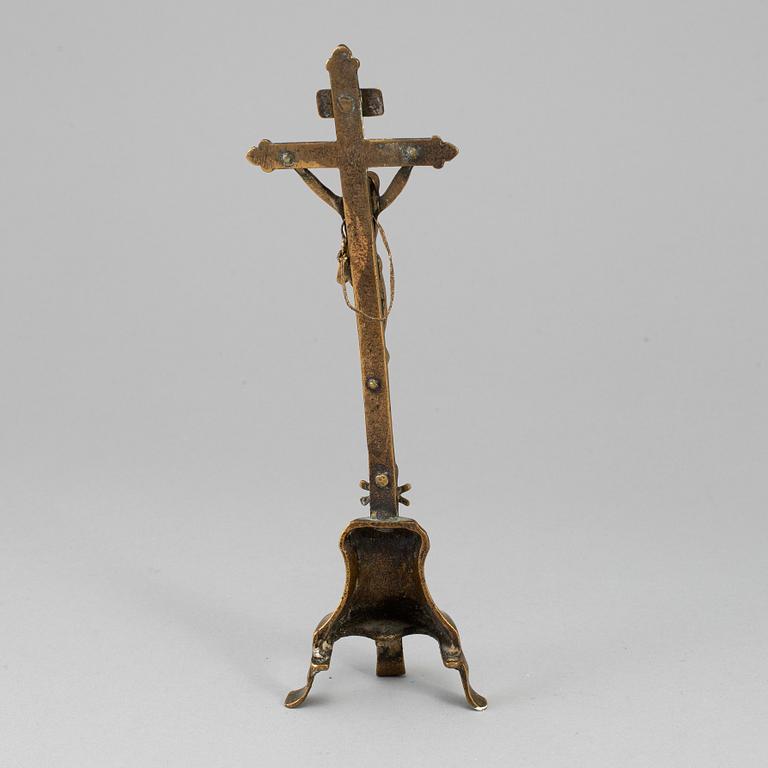 An 18th century brass crucifix.