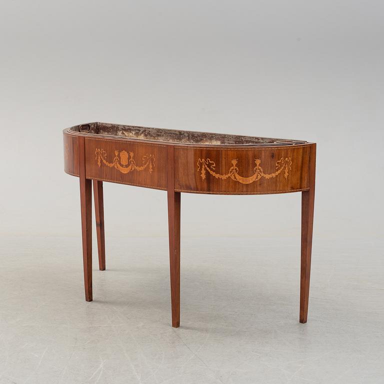 A late 19th century mahogany flower table.