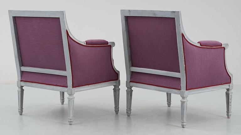 A pair of Louis XVI late 18th Century armchairs.