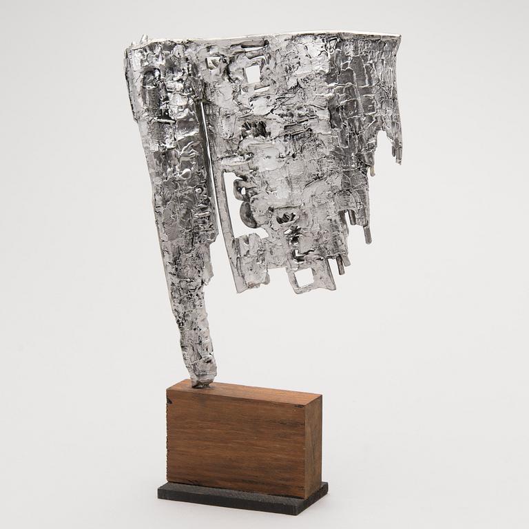 sculpture in metal, signed and dated 1980.