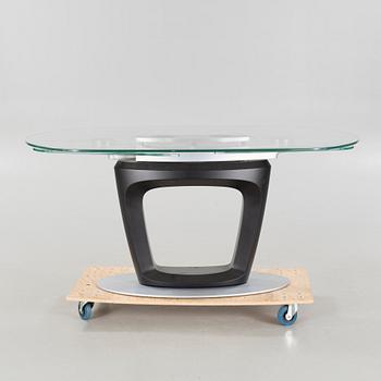 A 21st century "Orbital" dinner table by Pininfarina for Calligaris.