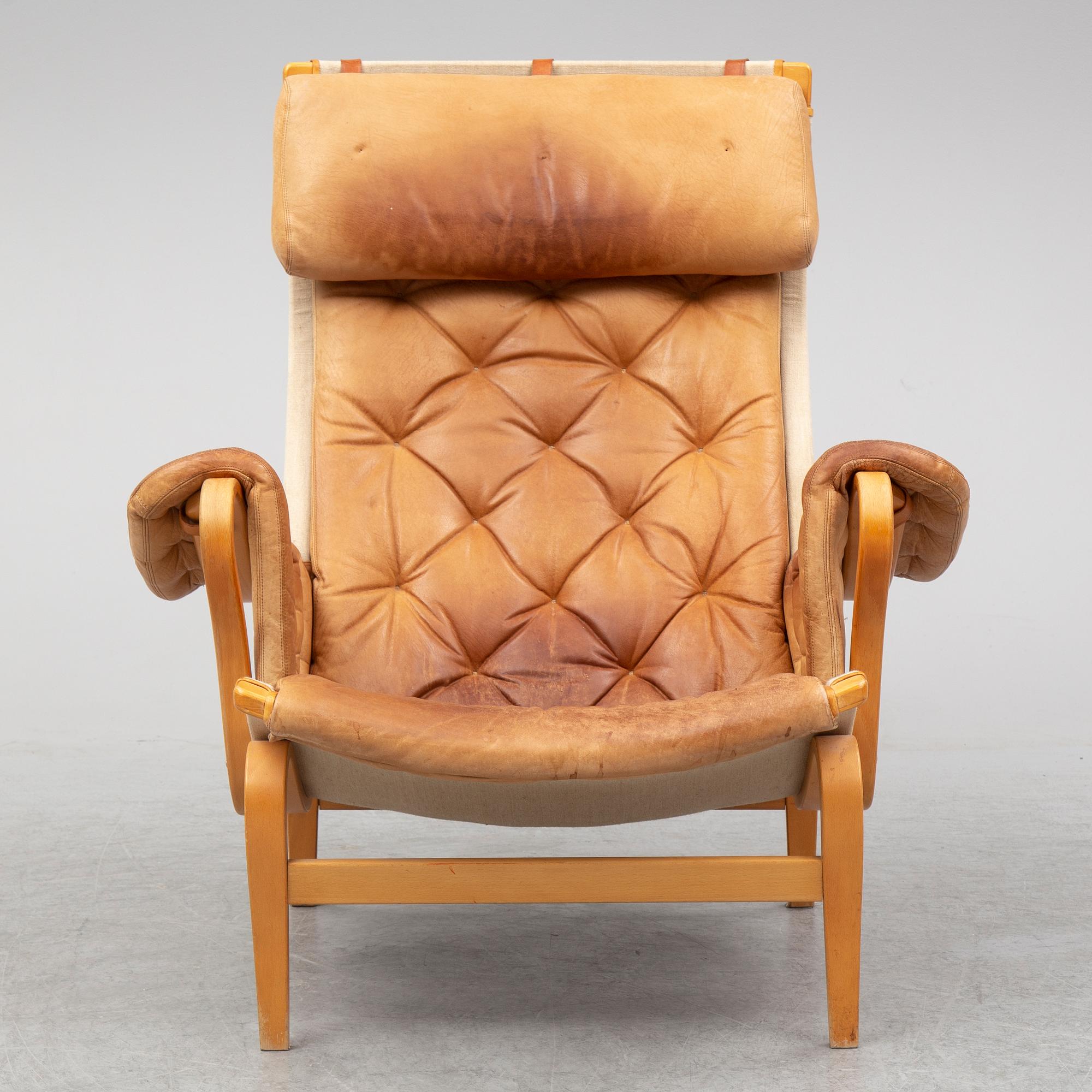 A 'Pernilla' armchair by Bruno Mathsson for dux.