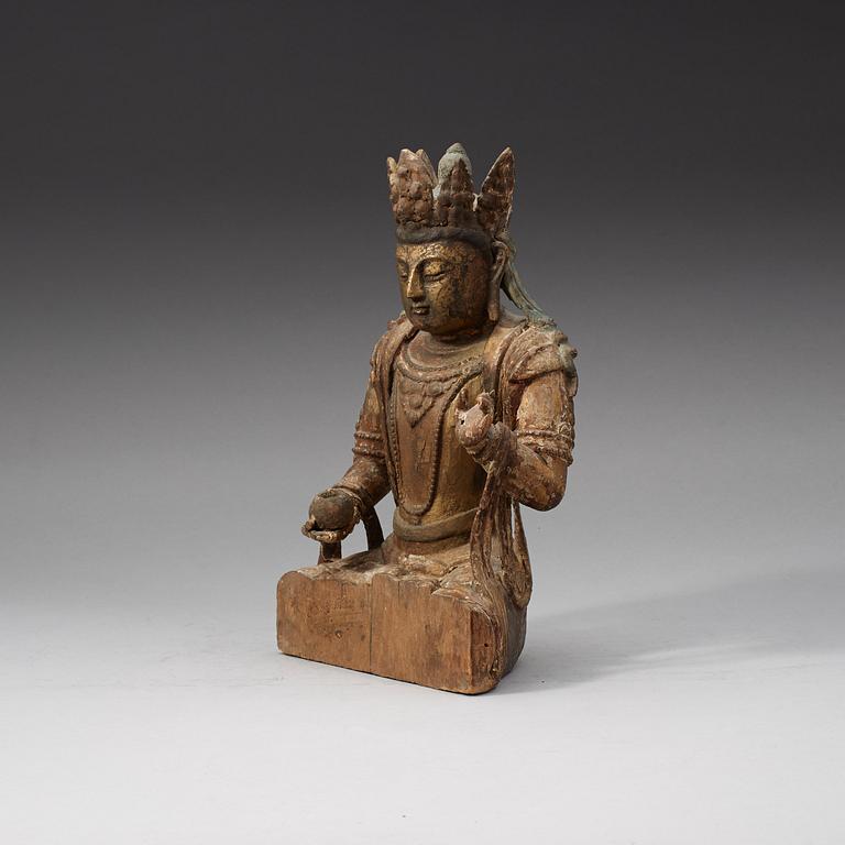 A wooden sculpture of a bodhisattva, Ming dynasty (1368-1644).