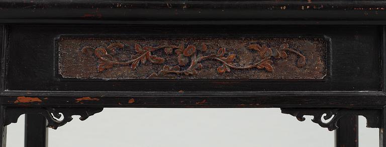 A black and red lacquered wooden chair, Qing dynasty.