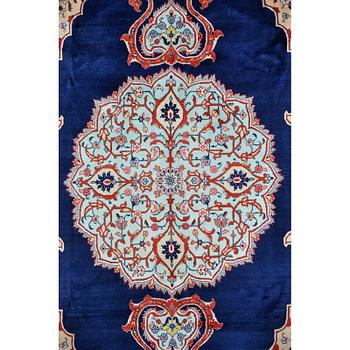 A carpet, Tabriz signed Nematzadeh, ca 291 x 176 cm.