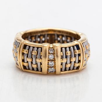 Cartier,an 18K gold and steel ring, with brilliant-cut diamonds.