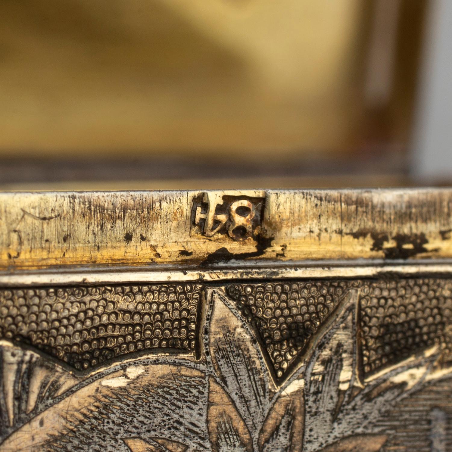 A Russian mid 19th century silver-gilt and niello snuff-box, mark of Moscow.