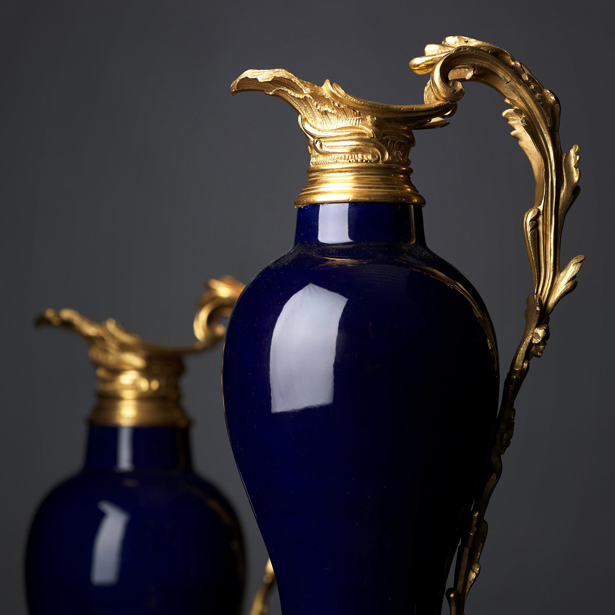 A pair of gilt bronze mounted vases, Qing dynasty, Qianlong (1736-95). French bronze mounts.