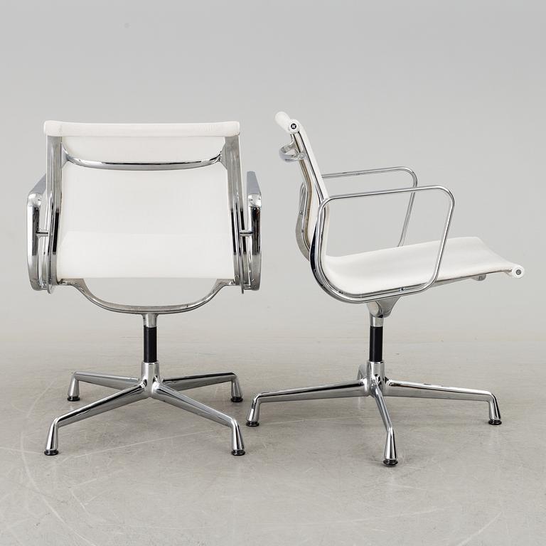 A pair of 'EA 108' desk chairs by Charles & Ray Eames for Vitra.