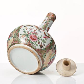 A Canton famille rose vase with cover, Qing dynasty, late 19th Century.