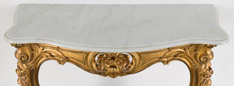 A gilt wood mirror and marble top console table, early 20th Century.