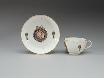 A Höchst cup and saucer, 18th Century.