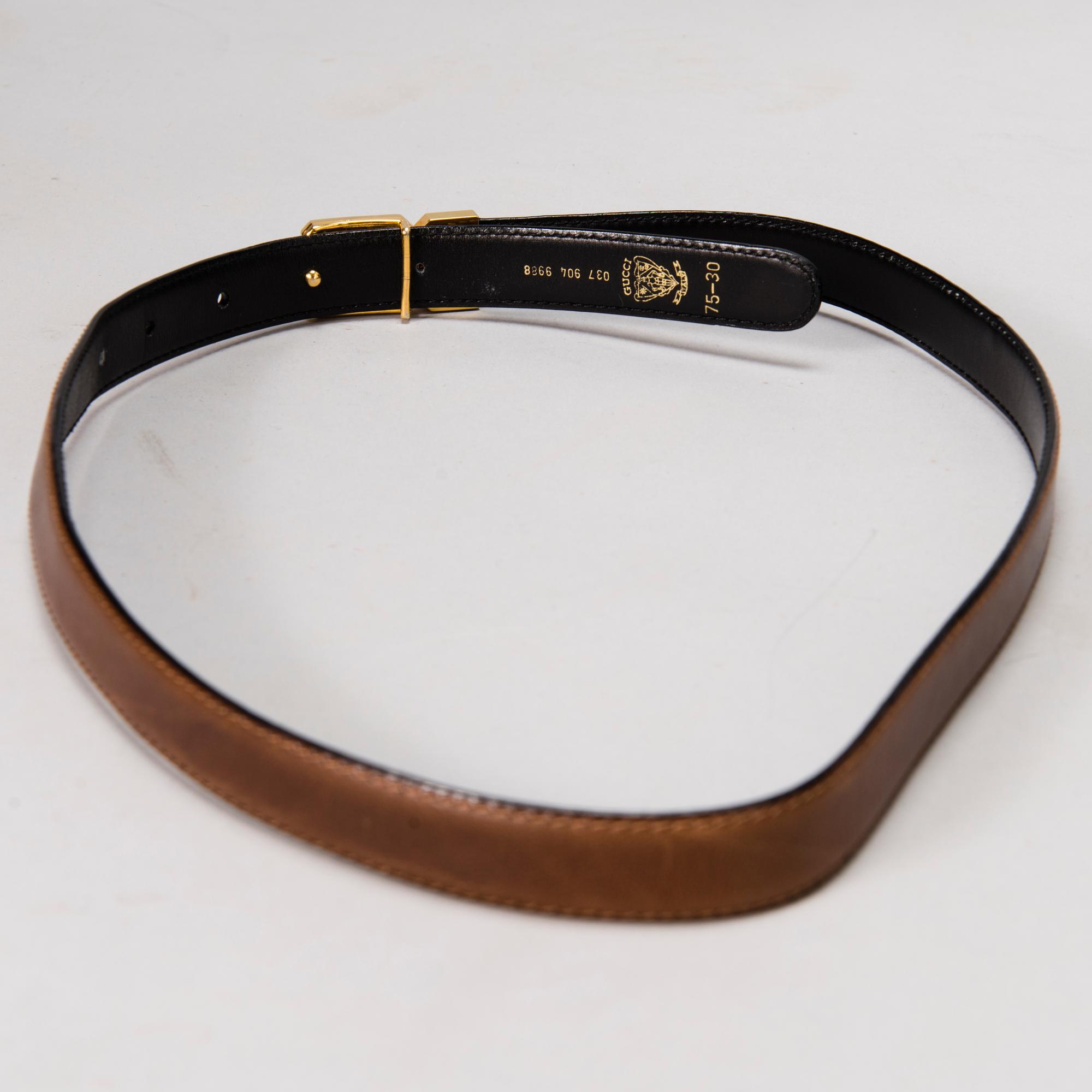 GUCCI Silk Blouse and a Leather Belt.