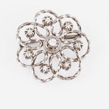 BROSCH, med en briljantslipad och 7 åttkantslipade diamanter.