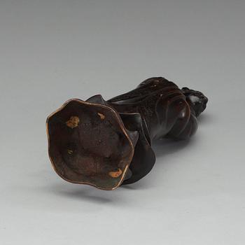A bronze figure of one of the Lohans, Qing dynasty (1644-1912).