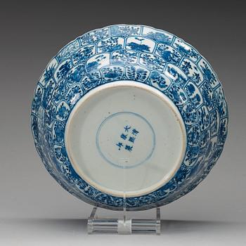 A blue and white punch bowl, late Qing dynasty with Kangxi six character mark.