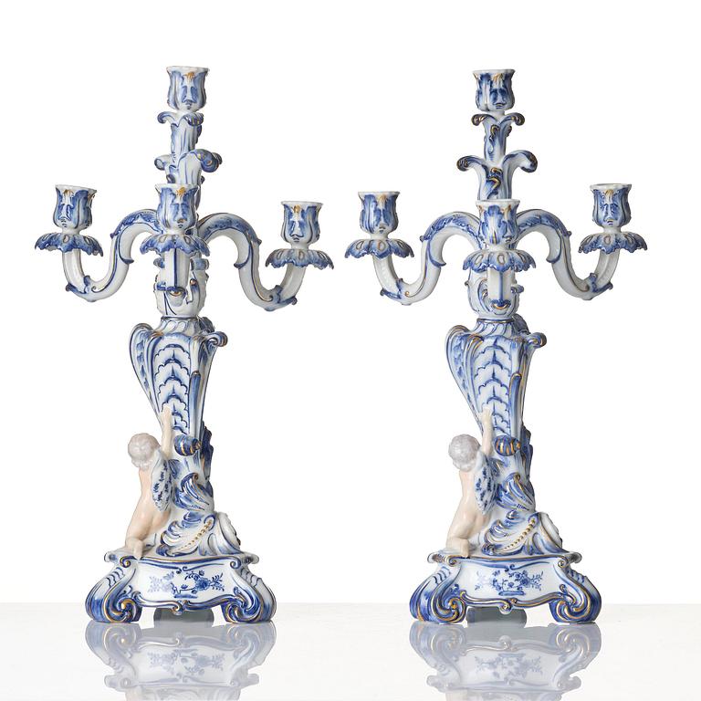 A pair of Royal Copenhagen 'Blå blomst' four-light candelabras, Denmark, 1900-tal.