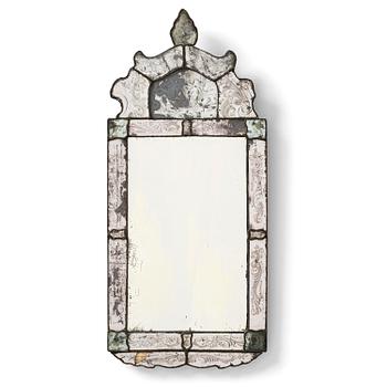 104. A Northern European late baroque engraved glass mirror, first part 18th century.