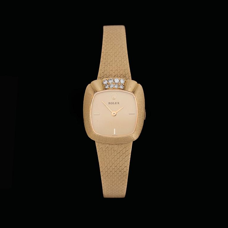 A Rolex gold and brilliant cut diamond watch, tot. app. 0.30 cts.
