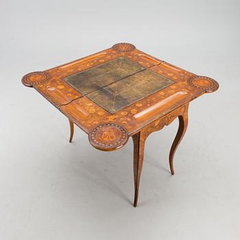 A RUSSIAN CARD TABLE, rococo middle of the 18th century.