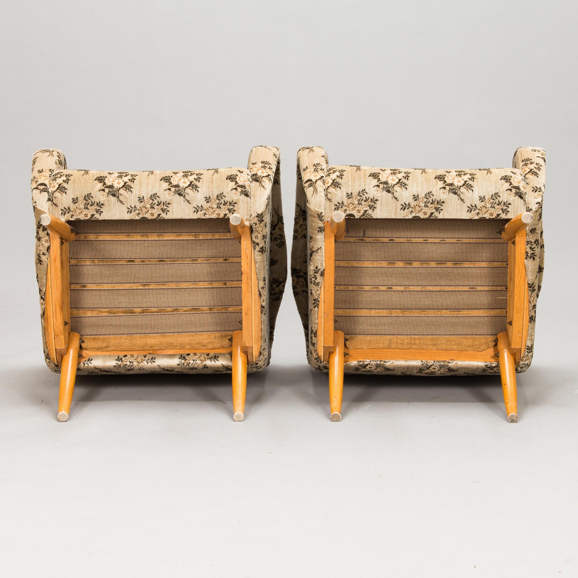 A pair of 1950s / 60s armchairs.